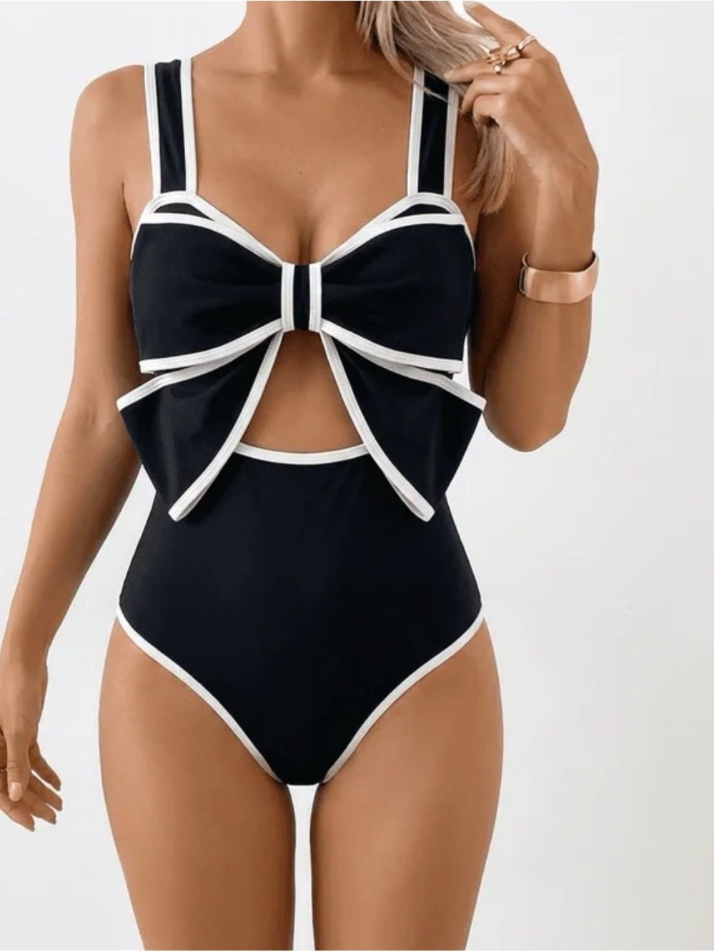 Black One-Piece Swimsuit with White Trim and Decorative Front Bow
